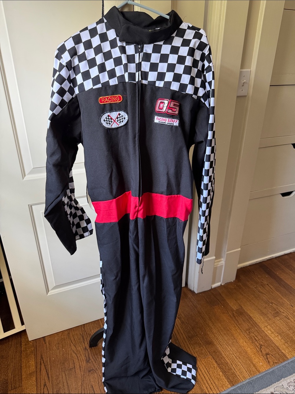 Black and White Checkered Racing One-Piece with Red Accent